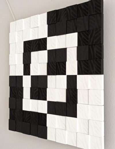 wooden wall art with minimalist modern design in black and white wooden tiles